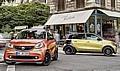 smart fortwo, Bodypanels in lava orange (metallic), tridion Sicherheitszelle in black; smart forfour, Bodypanels in black-to-yellow (metallic), tridion Sicherheitszelle in black